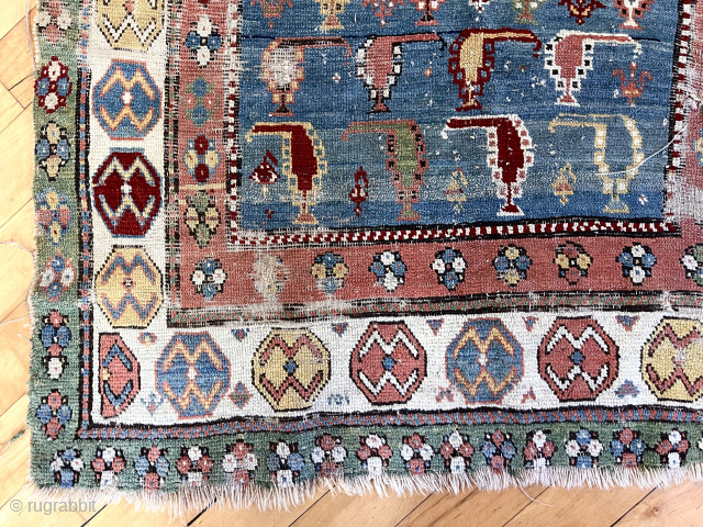 Out of the cedar chests. Early Caucasian rug with uncommon field. Great old colors. Truly non commercial. What Brim used to deliver. Not perfect condition. First half 19th c. 3’6” x 6’9” 