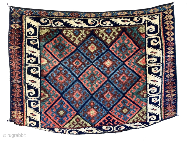 Out of the cedar chests. Jaf Kurd diamond bagface with an uncommon, possibly unique border. Great pile, great old colors. 19th c. 25” x 36”        