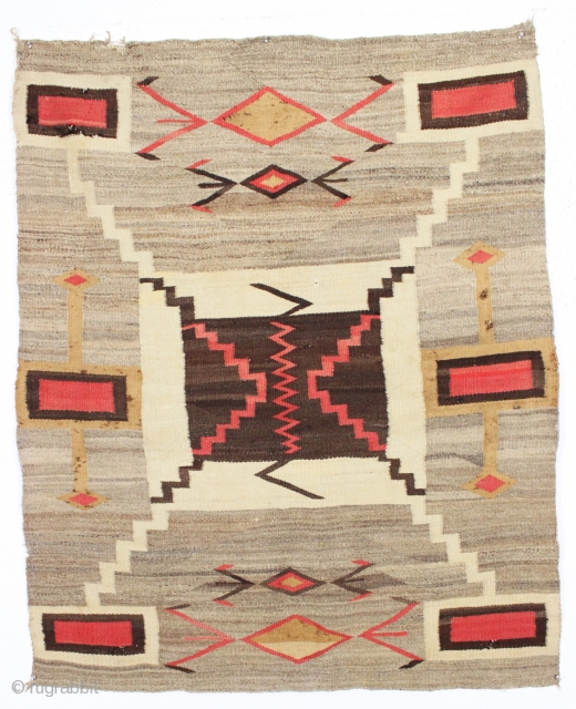 antique navajo rug. Most attractive and boldest storm pattern rug I have encountered. As found, reasonably clean with numerous little pulls and little spots of slight roughness a shown. Soft and supple  ...