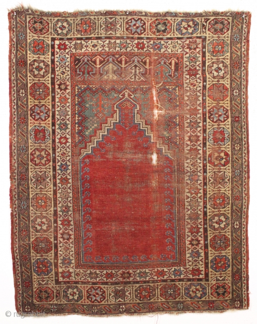 Early turkish mudjar prayer rug. Unusual and attractive borders. As found, very dirty with heavy wear and some damage as shown. All good natural colors.  Other than some edge wrapping I  ...