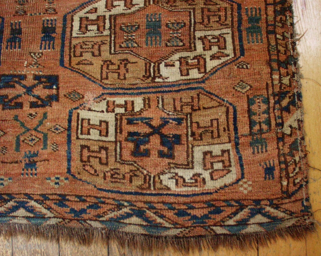 ANTIQUE TURKOMAN  STRANGE CARPET.  INTERESTING DESIGN WITH AN UNUSUAL VARIETY OF TRIBAL ELEMENTS. NEW ENGLAND FIND.  VERY DIRTY.  SOME HEAVY WEAR.  ASSYMETRIC KNOT.  APPEARS TO HAVE  ...