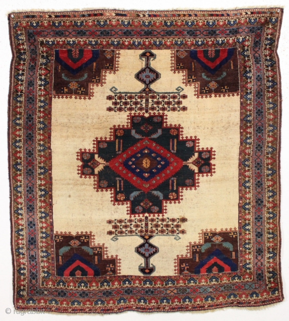 antique afshar rug. Great small square size and iconic design with an unusual light colored ground. All natural colors. Wool pile and wool foundation. As found, no repairs. The light colored wool  ...