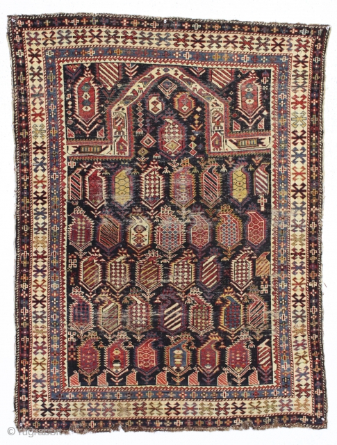 antique marasali prayer rug. Well drawn example of an iconic type. All natural colors. large serrated boteh filled with a good variety of designs.  Intact but thin with scattered wear as  ...