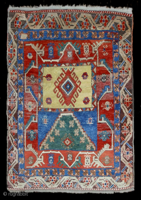 19th.c. Konya-Yürük,145X120cm with archaic design.Great condition,thick pile, and original selvages and kelim-bands.                     