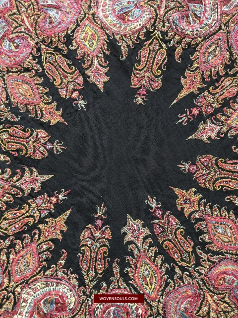 A heavily embroidered Kerman shawl with some applique work. Extremely dense work that has motifs within motifs. See more here: https://wovensouls.com/products/1525-antique-persian-kerman-kirman-resht-rasht-patteh-pateh-doozi-embroidered-wool-shawl            