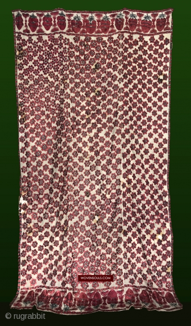 Lovely Old Bridal Sindh Shawl with very lustrous silk. Worth a look. 

https://wovensouls.com/products/1365-superb-antique-sindh-odhana-abochani-wedding-shawl-six-petalled-flowers                    