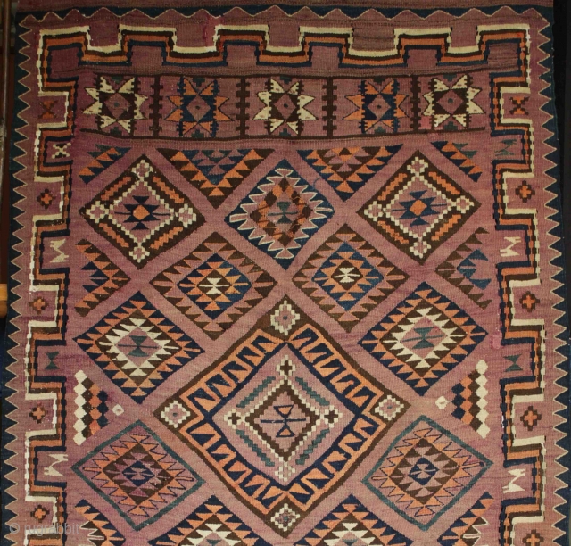 A large old east Afghan tent kilim. Hand spun dyed brown/purple sheep wool in the field/background with some abrash and natural white wool and I a combination of natural and synthetic dyes  ...