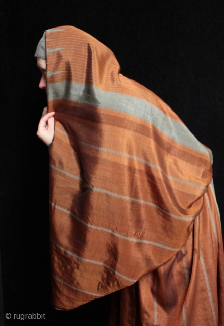 Syrian woman’s silk abaya street dress from Aleppo

Technically a combined skirt and attached shawl, this type of fine woven silk is called 'meydaniyyeh' in local Aleppo/Gaziantep terminology. Often referred to as an  ...