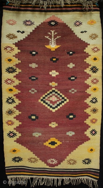 An interesting small Muhajir prayer kilim with çiçim embroidered burdock motifs and minimalist tree of life - bowl? motif in the prayer niche and striped kilim ends. This unusual kilim with some  ...