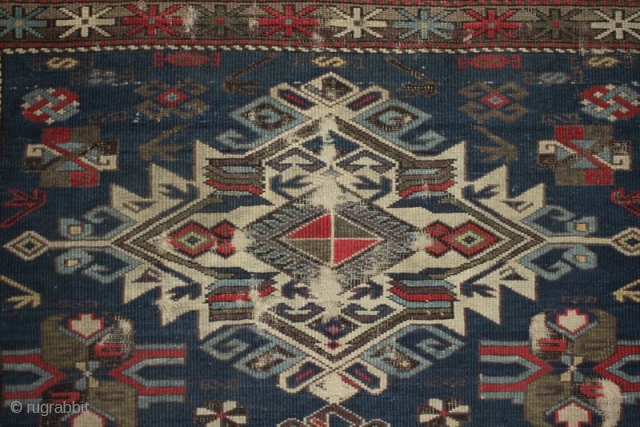 A worn 19th century Shirvan rug with archaic large medallions. Foundation and loss to borders, an interesting example. 140x120cm

For more photos see: http://www.kilim.ie/TRIBAL_RUGS_and_KILIMS/Pages/SMALL_KNOTTED_RUGS.html

Please contact me for more information     