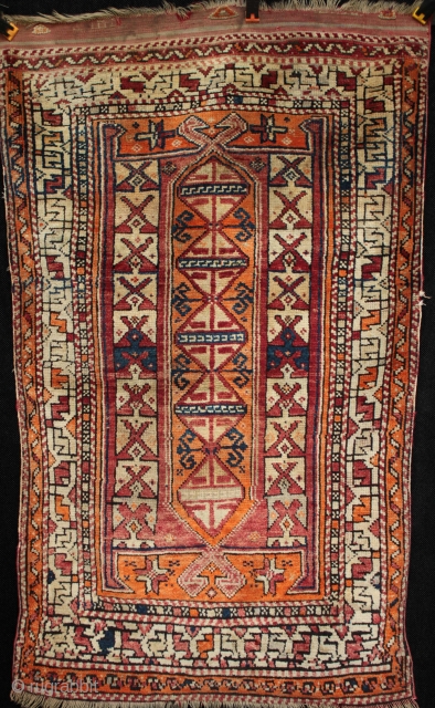 Interesting dated 19th century Anatolian prayer? rug from the Kosak area of Balikesir district between Çanakkale and Ezine in N.W. Anatolia. Natural dyes and possibly synthetic orange, kilim guard ends with triangular  ...