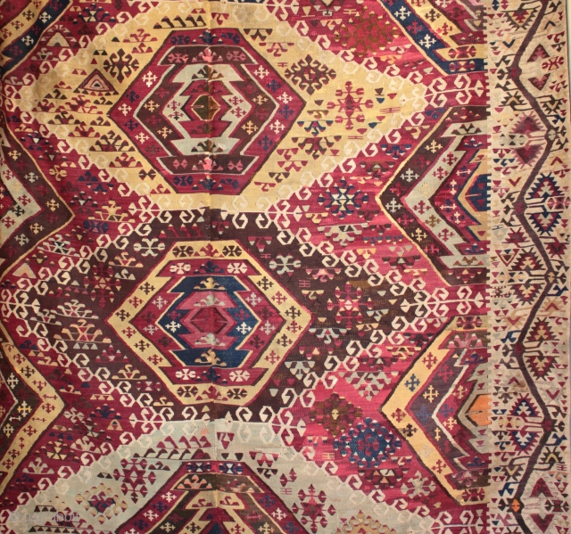 Fantastically detailed, tribal Anatolian Avshar dowry kilim.

This unusually wide kilim at nearly 2 metres, was woven north of Adana towards Kayseri (Pınarbaşı - Sarız) and has a particularly attractive wide ‘su yolu’  ...