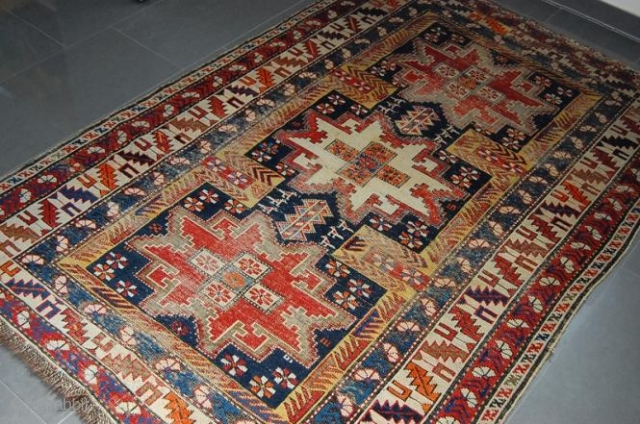 CAUCASIAN LEZGHI SCHIRWAN 172 x 117 cm, some synthetic orange.                       