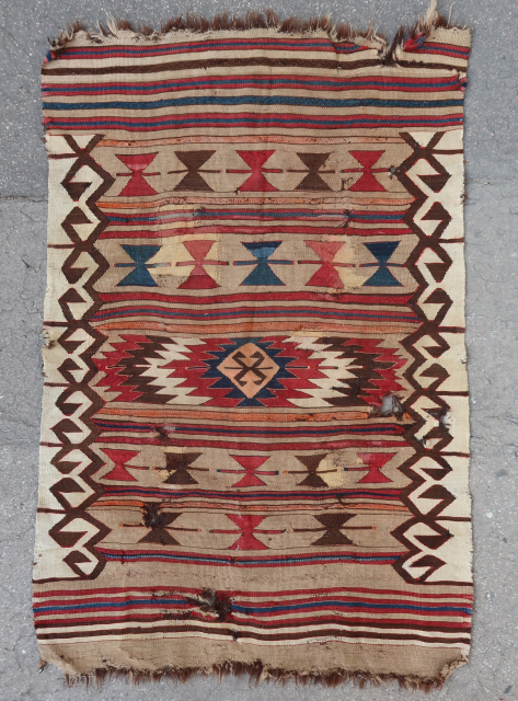 Unique and iconic, old and small Mut kilim (125 cm x 85 cm) (49,2 in x 33,45 in) This piece ticks a lot of boxes on the list of early kilims features,  ...