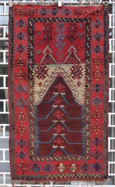 Old and beautiful Konya "Tulip panel" kilim (179 cm x 102 cm)
Very good dyes, including an especially beautiful saturated red
Overall good condition, with a stain, and 2 small repairs in the upper  ...