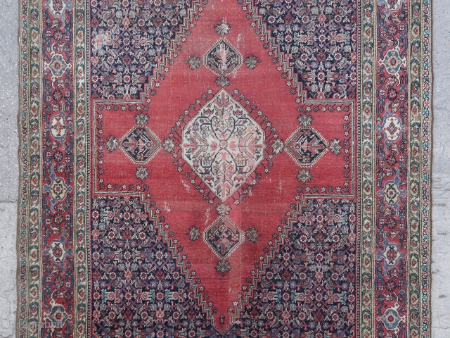 Old and beautiful small Farahan rug. (193 cm. x 131 cm.).
Unusual small format and medallion design, could make a great hanging or a low traffic area floor antique rug.
Obvious repairs, damages, but  ...