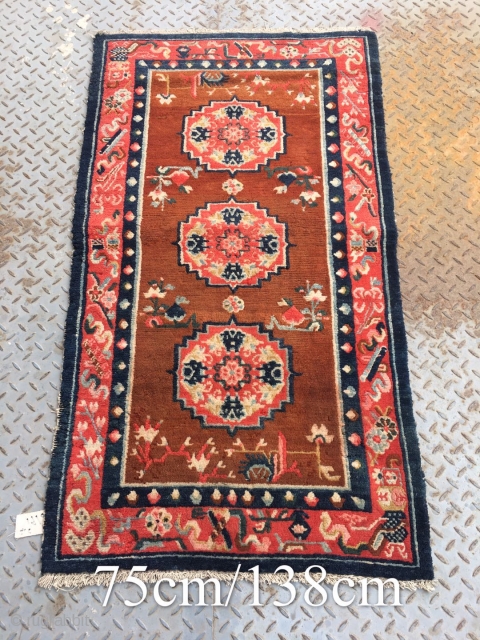 Tibetan rug, group flower pattern with Chinese Bogu veins selvage. Good age and condition. Size 138*75cm(53*29)                 