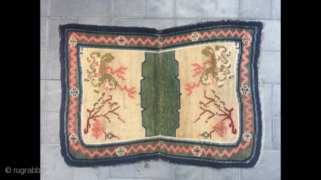 Tibetan horse saddle rug, Light camel background with  snow mountain lion pattern. Good age and condition. Wool warp and weft.
Size 95*62cm(37*24”)           