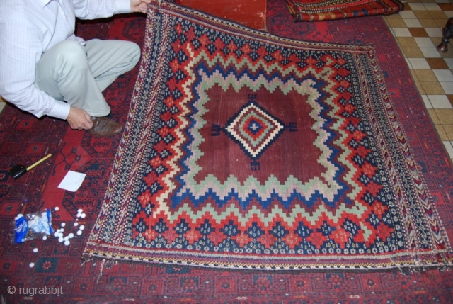 a beautiful handmade sufrah kilim from herat afghanistan it's in a very great condition with beautiful colours and it's about 80 years old the size is 129 x 122 CM for more  ...