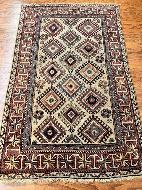 3308 Antique Kazak 100% wool.
Full pile and all natural dyes.
Ends are over cast and two new edge binding.
5'8" X 3'7"
             