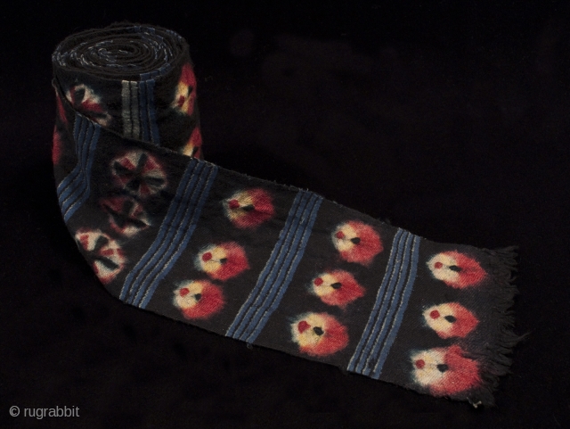 Kaabo nambu belt or sash, Tibet. These sashes are tied over a coat. Nagbu-tigma (tie-dye) on black wool. 6.5" (16.5 cm) wide by 152" (386 cm).       