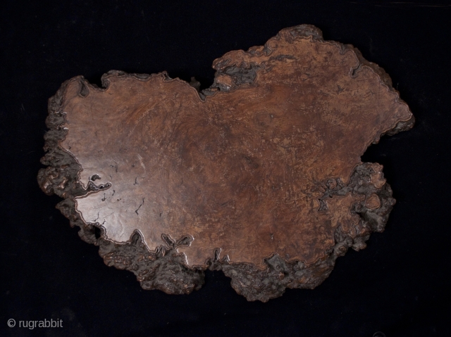 Burl base
Japan
Wood
30" (76cm) wide, 22" (56cm) high, 3" (8 cm) thick
Meiji Period
This base is unusual with incised lines along the edge on both front and back. It weighs 30 pounds. 
#8184   ...