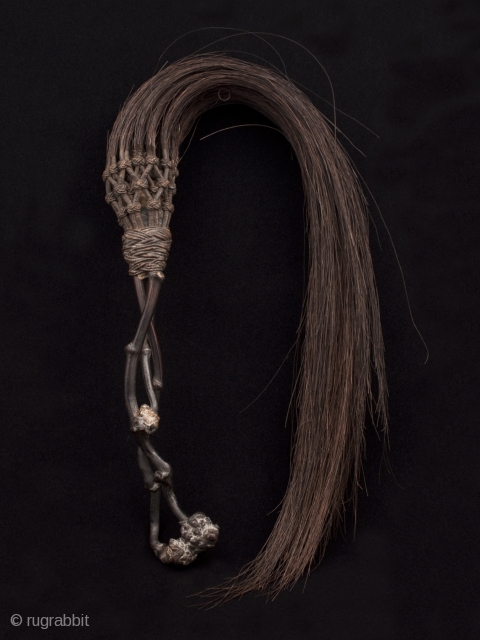 Fly whisk,
Alor Island, Indonesia.
Thorn root, horse hair, copper wire,
Late 19th to early 20th century,
32" long.
Ex. estate collection of Joseph G. Gerena, NYC 
          