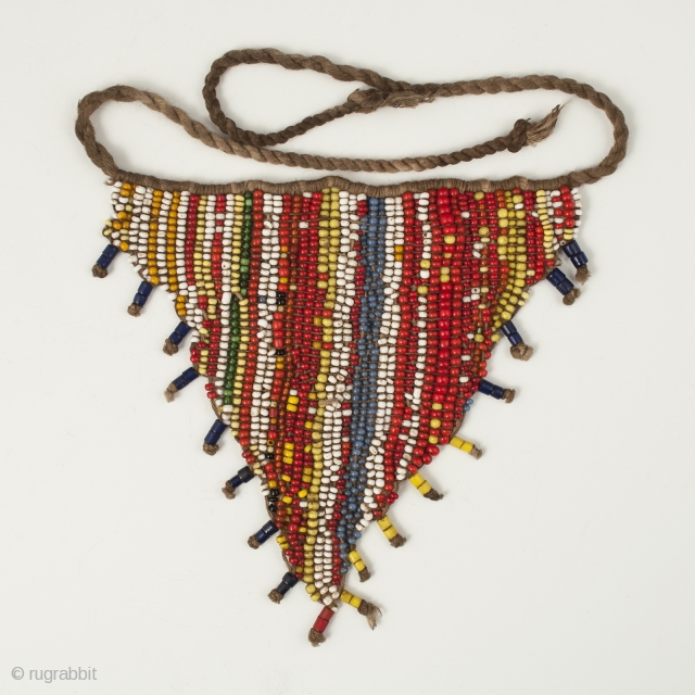 Pikuran (cache-sexe), Bana Guili people, Mandara Mountains, Cameroon. Seed beads, cotton string, 5" (12.7 cm) wide by 4.75" (12 cm) high. Mid 20th century. These were worn by young girls during ceremonies,  ...