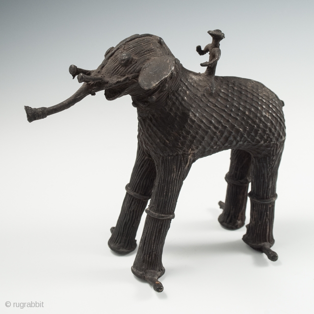 Elephant and rider, Kondh people, Orissa, India. Cast copper alloy, 5.25" (13 cm) high, Late 19th to early 20th century, Ex. Al Farrow. A bridal dowry sculpture in the form of an  ...