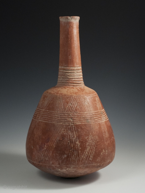 Terracotta Bottle, Djenne area, Mali, 15" (38 cm) high by 24.75" (63 cm) in circumference, late 19th to early-20th century. A handsome terracotta bottle from the Djenne area of Mali with incised  ...
