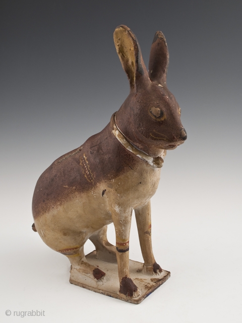 Rabbit Bank,
Tlaquepaque, Jalisco, Mexico,
Earthenware, slip decoration, glaze,
c. 1950s
11.5" (27.3 cm) high by 8.5" (18.4 cm) wide, as photographed from side
Ex. Fred and Nancy Roscoe collection, California 	

This charming, slightly eerie rabbit bank  ...