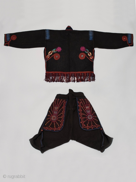 Man's ceremonial (cofradía) outfit, Chichicastenango, Guatemala. Wool, silk thread, Mid-20th century. 25" (63.5 cm) shoulder to hem by 59" (274 cm) across shoulders. It is rare to find a complete cofradia outfit  ...