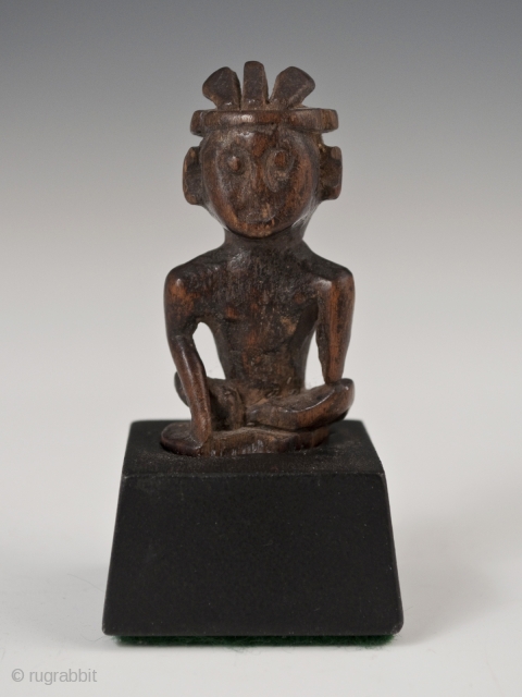 Small wood charm,
Dayak, Borneo.
3" (7.6 cm) as based.
19th century.                        