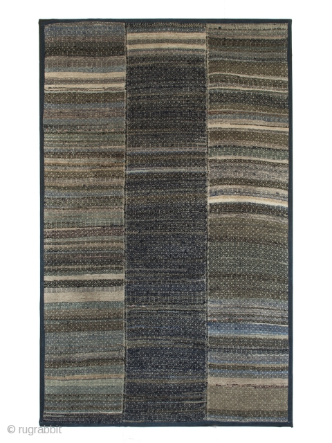 Blanket, Miao ethnic group, Guizhou Province, Southwest China. 71" (22.8 cm) high by 45" (7.6 cm) wide. Early 20th century.
This strip woven blanket is made from recycled fabrics, most of them indigo  ...