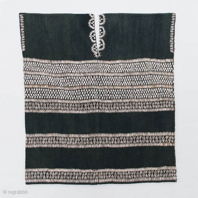 Woman's blouse or tunic, Karen ethnic group, Burma. Cotton, Job's tears (Coix lacryma-jobi). 31" (38 cm) high by 29" (71 cm) wide. Mid-20th century. In excellent condition with only a couple of  ...