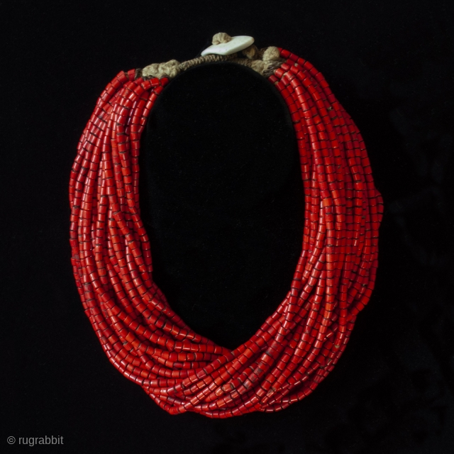 A festive red beaded necklace, Naga people, Nagaland, Northeastern India. Trade beads, shell, string, early to mid-20th century, 20" (58.8 cm) inner circumference.


          