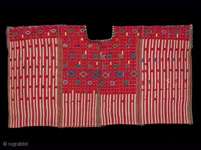 Huipil (blouse),
Colotenango village, Guatemala.
Cotton.
1970s,
18" (45.7 cm) high by 33" (84 cm) wide.
Ex. private San Francisco collection

The body of this huipil was hand woven on a back-strap loom in two red and white  ...