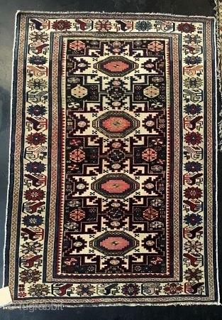 Antique Hand-Woven Caucasian Lesghi Azeri Rug

Antique Caucasian Azeri rug, hand-woven, all wool with Lesghi-styled pointed star medallions in navy blue and red tones against cream ground. 

late 19th century 

Dimensions: 2' 10"  ...