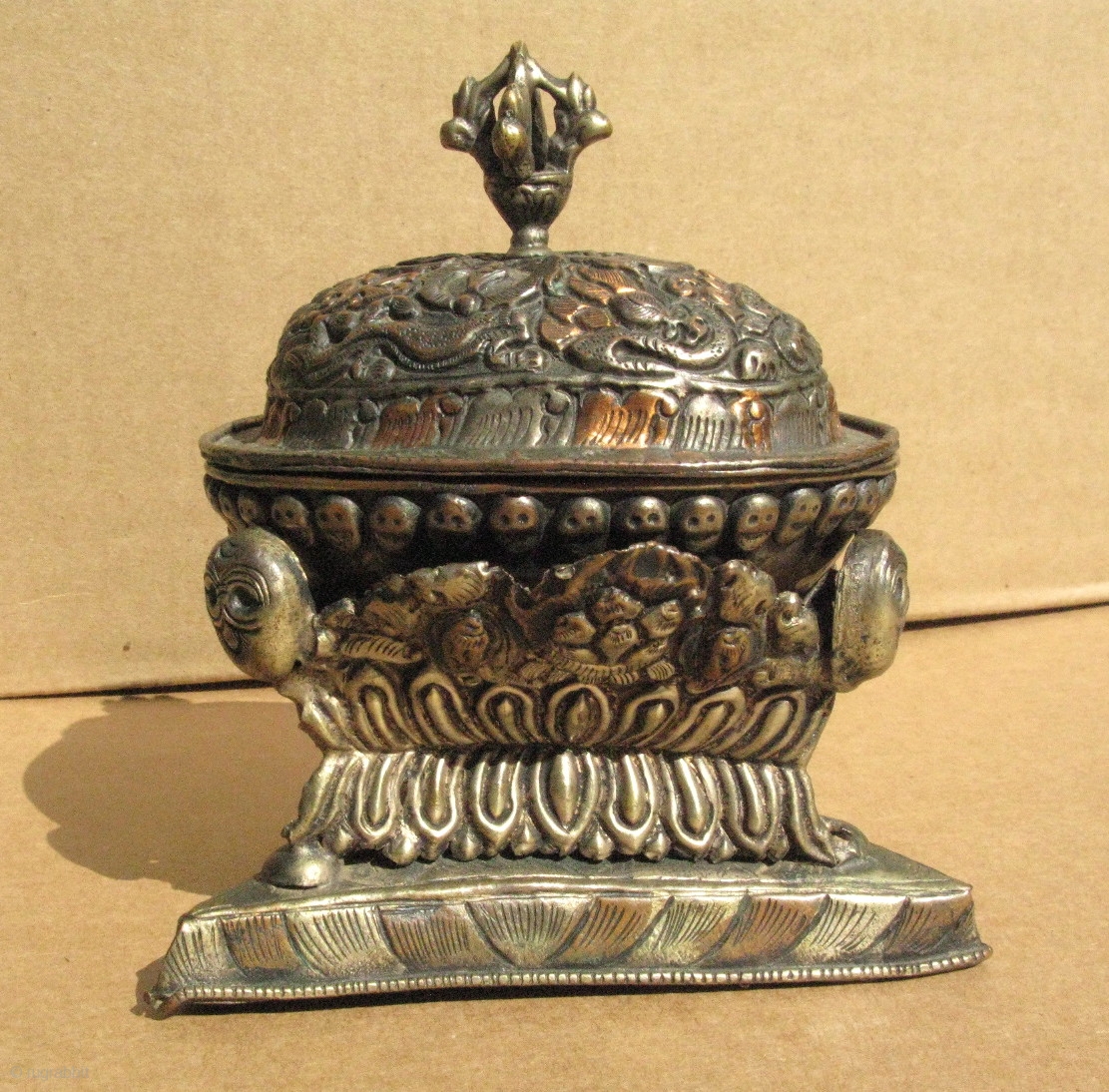 A small vintage Buddhist libations cup, Tibet, made in the form of a ...