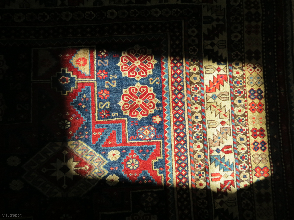 Armenian rug in quite good condition. The white spot is strong sunlight ...