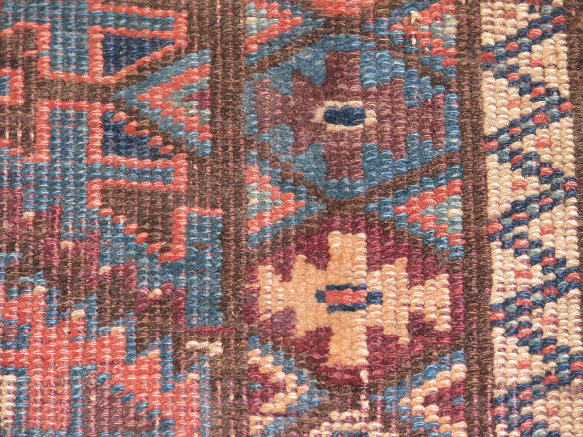 unusual antique rug fragment.it has fantastic colours.all naturel.but i