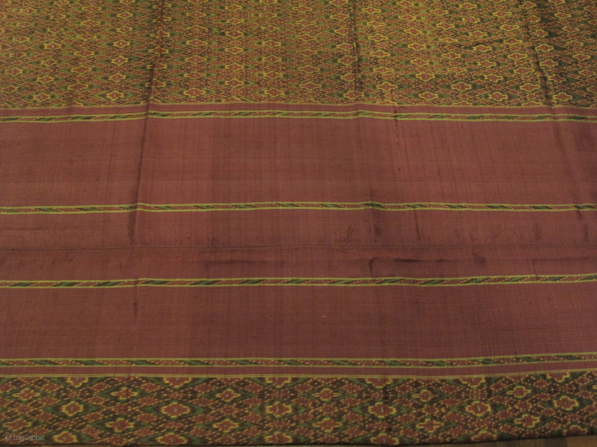 A weft ikat silk tube skirt from Northeastern part of Thailand with an ...