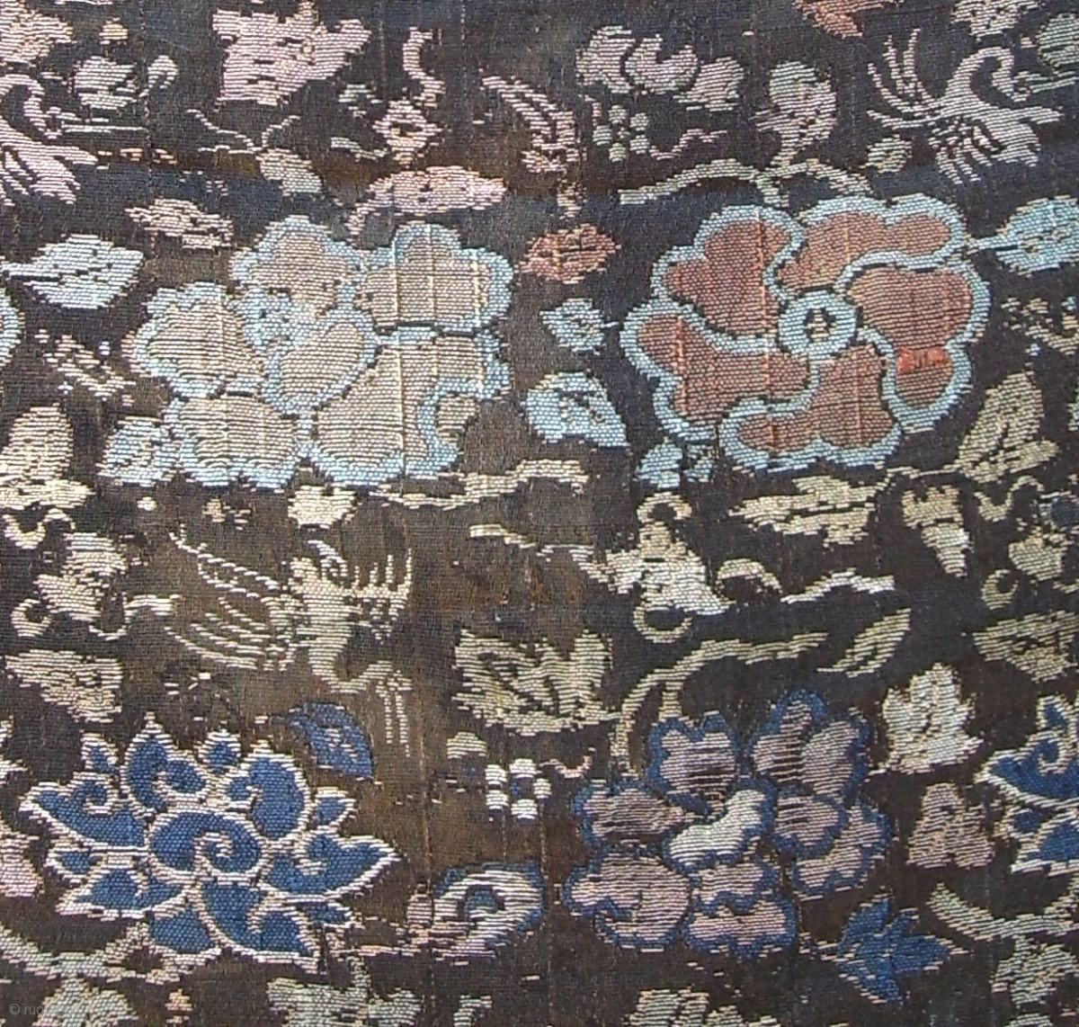 A gold brocaded silk weaving with flowers and cranes. Late Ming, most ...