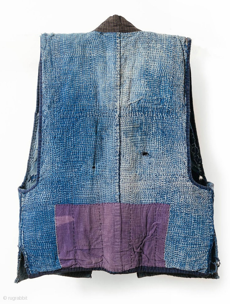 This is a boro sashiko sodenashi, a type of sleeveless hanten, or