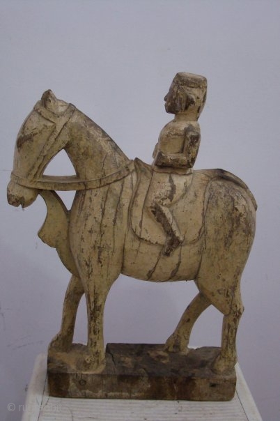 wooden horse rider