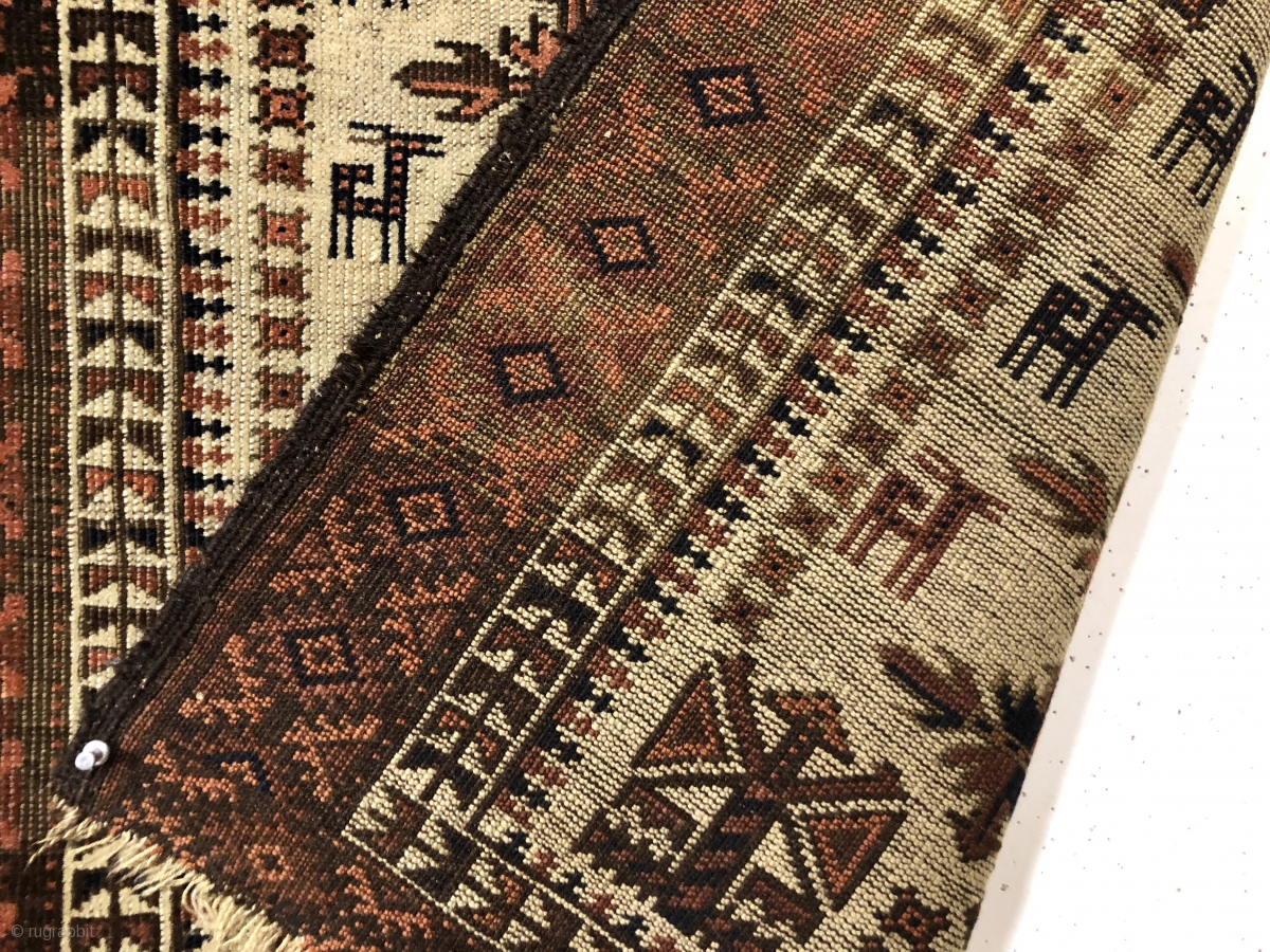 Antique ivory ground Baluch rug with a charming design featuring many ...