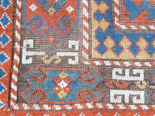 Kazak rug, 2.40m x 1.50m, 7'10" x 4'11", 19th century. Very well-balanced design with some early features. Some minor damage, old repairs and corrosion/ replaced browns.       