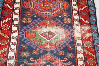 Just in! 19th century North-west Persian runner. 4.00m x 1.05m  (13' x 3'6"). Really good colours, and strong design. Archaic drawing of the medallions. Note also how each medallion is different!  ...