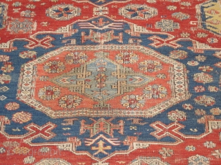 Soumac carpet 2.75m x 2.32m (9' x 7' 8") circa 1880. Superb colour range, with unusual quadruple medallion format. Heavy corrosion of the browns but in honest 'estate' condition. Most of the  ...