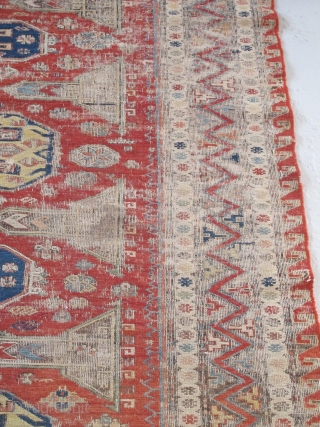 Soumac carpet 2.75m x 2.32m (9' x 7' 8") circa 1880. Superb colour range, with unusual quadruple medallion format. Heavy corrosion of the browns but in honest 'estate' condition. Most of the  ...